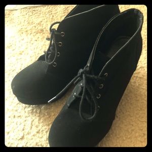 Black wedge booties